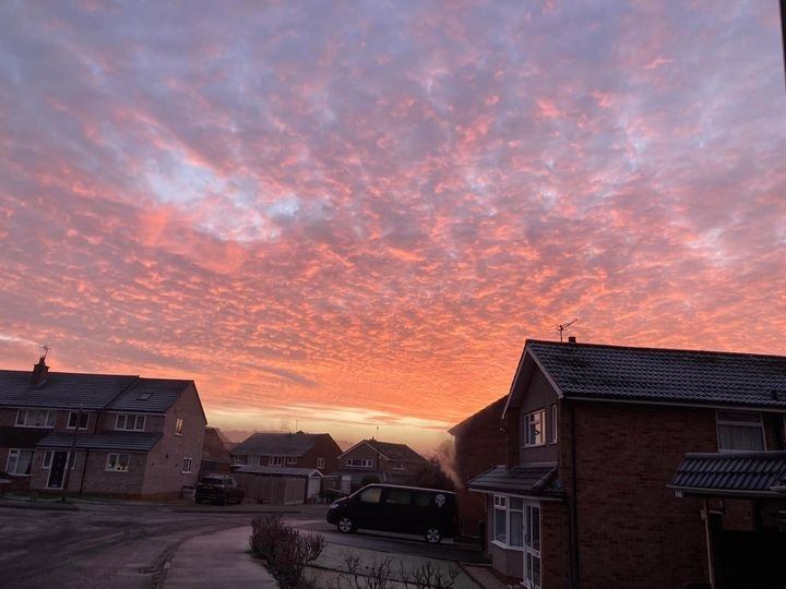 Lickey End dawn with a pink mackrel sky