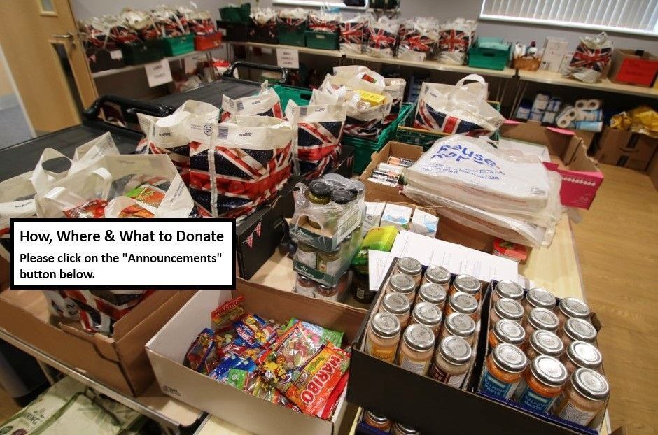 Inside the Baptist Church food bank - boxes and bags of assorted food