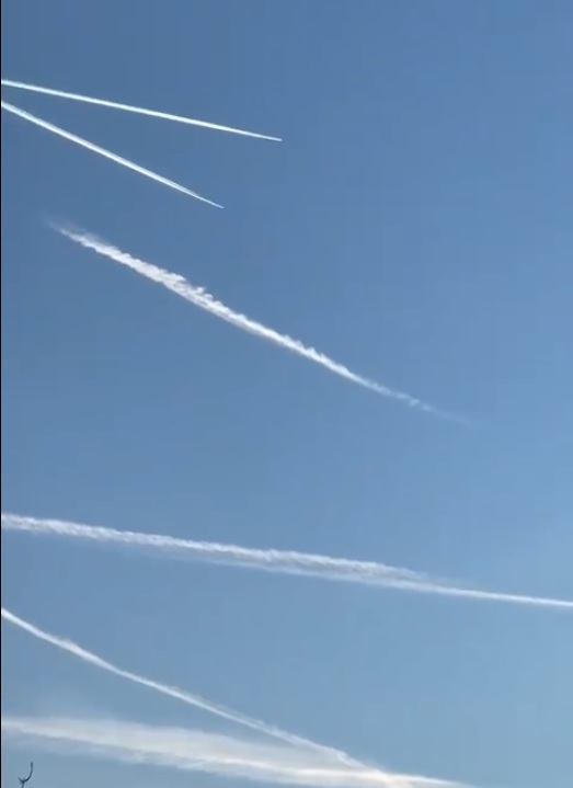 multiple cross-cross vapour trails over catshill